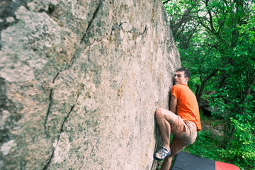 The climber is climbing bouldering.