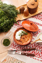 roasted potatoes with sauce in the pot