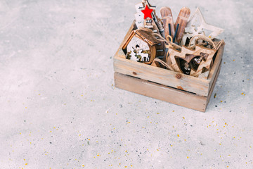 Wooden Christmas decoration in box. Vintage background .Copy space