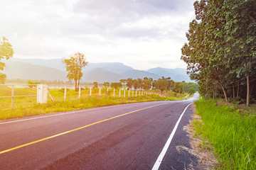 Fototapeta premium beautiful sunset on asphalt road
