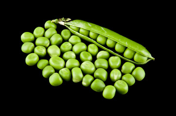 green peas on a black background close-up
