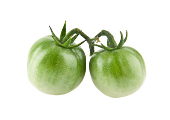 green tomatoes isolated on white background closeup