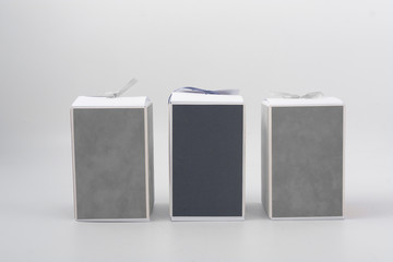 packing for gifts. cardboard boxes with bows.