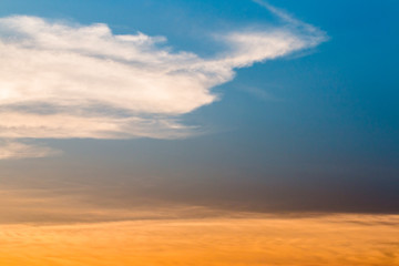 colorful dramatic sky with cloud at sunset.