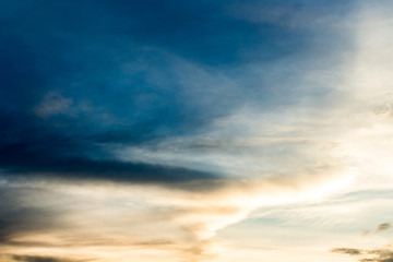 colorful dramatic sky with cloud at sunset.