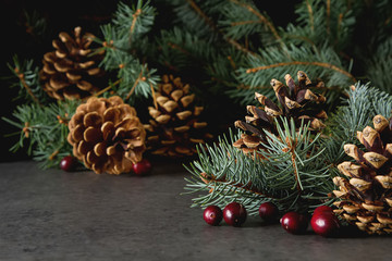 Obraz na płótnie Canvas Christmas tree bells. New Year dark background.