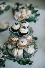 Cake Dessert with macaroons and cake, decorate green tone