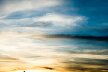 colorful dramatic sky with cloud at sunset.