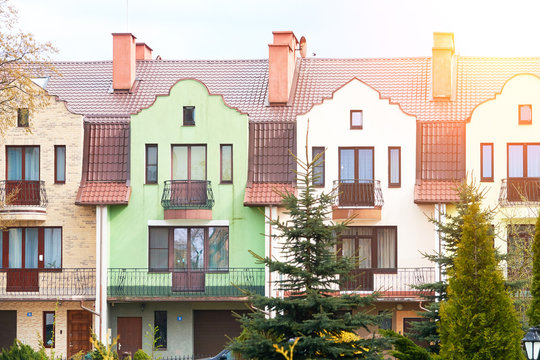 Colorful houses facades, pastel pale colors in Europe.