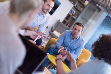 Startup Business Team At A Meeting at modern office building