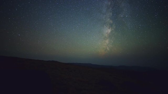 Milky way stars pan dark sky from summit of Steens Mountain in fall
