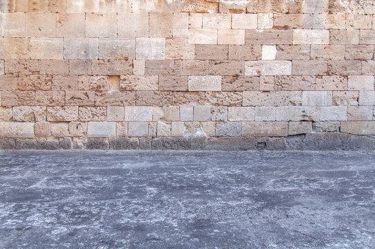 Castle cement floor with yellow rugh pattern stone block from ancient structure texture