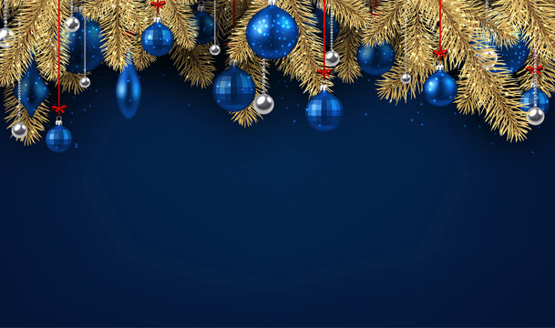 Blue Christmas background with spruce branches.