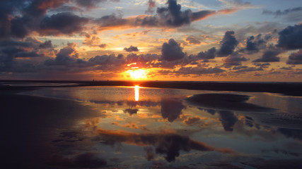 Fototapeta na wymiar Sunset on a Beach