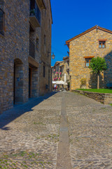 Fototapeta na wymiar Ainsa medieval village of the Pyrenees with beautiful stone houses, Huesca, Spain