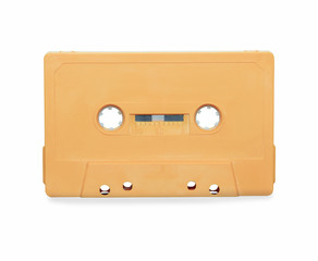 vintage orange audio cassette tape isolated over white