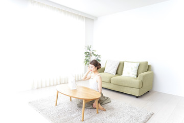 woman making herself up at home