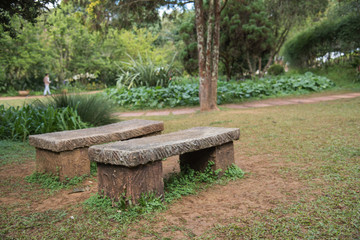 stone chairs in the garden at doi ang khang chiangmai thailand