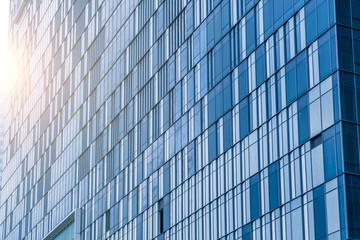 Obraz na płótnie Canvas Low angle view of financial district skyscraper glass