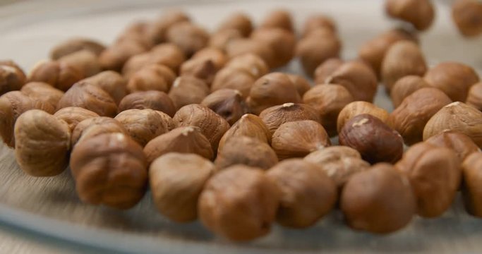 Nuts falling slowmotion &ndash; orginal file&nbsp;: 4K DCI, PRO RES 444, 12 bits