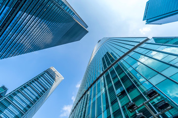 Fototapeta na wymiar Low angle view of skyscrapers architectural glass