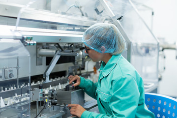 pharmaceutical factory worker at the workplace