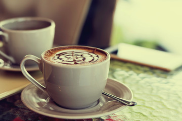 close up coffee cup in coffee shop  effect filter vintage style