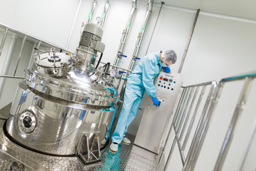 scientist is working with control panel