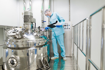 scientist is working with control panel