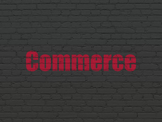 Fototapeta premium Finance concept: Painted red text Commerce on Black Brick wall background