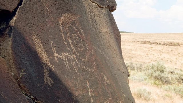 Pronghorn antelope and swirl close Ancient Native American Indian Rock Art at Petroglyph Lake Hart Mountain National Antelope Refuge 149