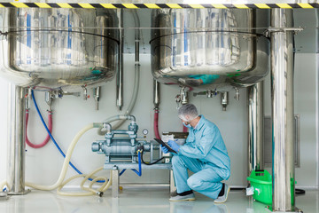 scientist work with high-pressure tanks