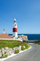 Fototapeta na wymiar Europa Point Lighthouse (Trinity Lighthouse or Victoria Tower). British Overseas Territory of Gibraltar.