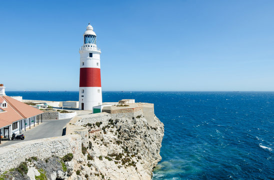 Europa Point Lighthouse (Trinity Lighthouse or Victoria Tower) on the cliff. British Overseas Territory of Gibraltar.