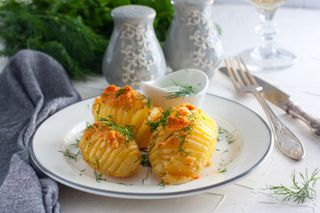 Baked potatoes with butter and breadcrumbs, horizontal