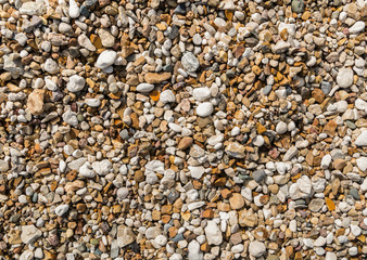 gravel stone background. natural texture sea coast travel holidays