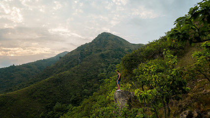 a guy in a green jungle