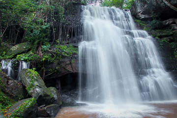 Waterfall mountain landscape select focus with fair light, Waterfall in mountain forest Blurred or blurry soft focus