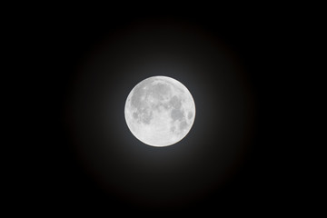 Fototapeta na wymiar Full Moon Through Hazy Cloud