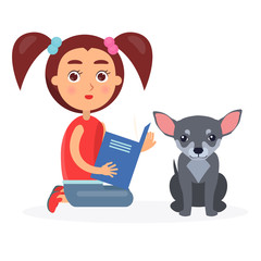 Small Girl Reads Blue Book to Little Chihuahua