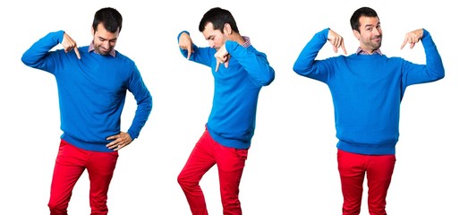 Obraz premium Set of Handsome young man pointing down