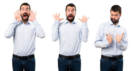 Set of Handsome man with beard making surprise gesture