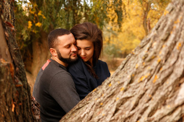 Romantic couple in love in autumn park