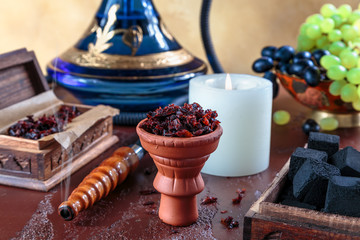 Shisha lies in the ceramic bowl made for Smoking hookah