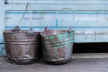 2 old shabby metal buckets - 179284214