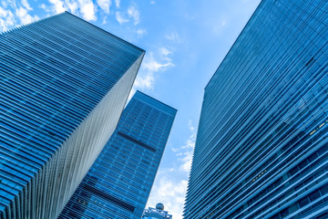 Obraz na płótnie Canvas Low angle view of skyscrapers architectural glass
