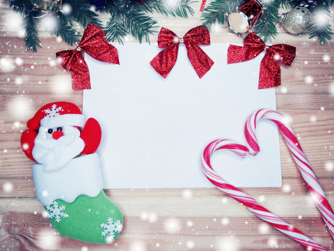 christmas decoration copy space and snow on wooden background