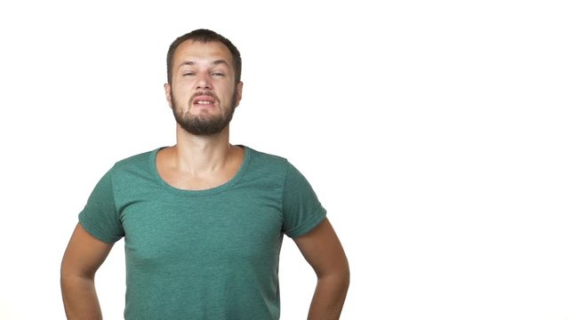 slow motion portrait of upset caucasian man going mad suffering frustrated expressing outrage screaming clutching his head over white background closeup copy space. Concept of emotions