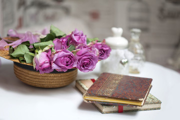 Pink roses and old books