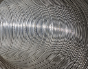 Aluminum corrugated pipe. View from the inside. Texture.
